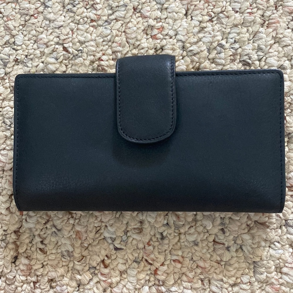 Woman’s navy blue wallet